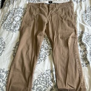 Tan and brown chino pants. Size 30 32